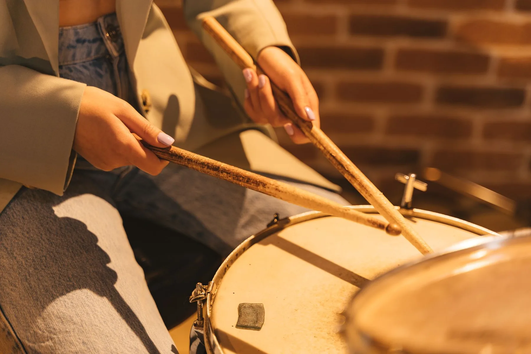 Drumsticks on a drum close-up Drumsticks on a drum close-up