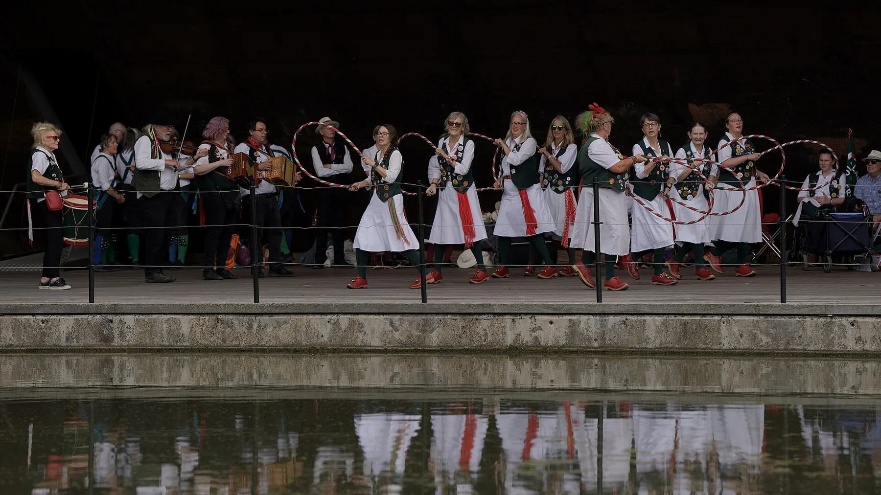 Musicians and dancers performing outdoors Musicians and dancers performing outdoors