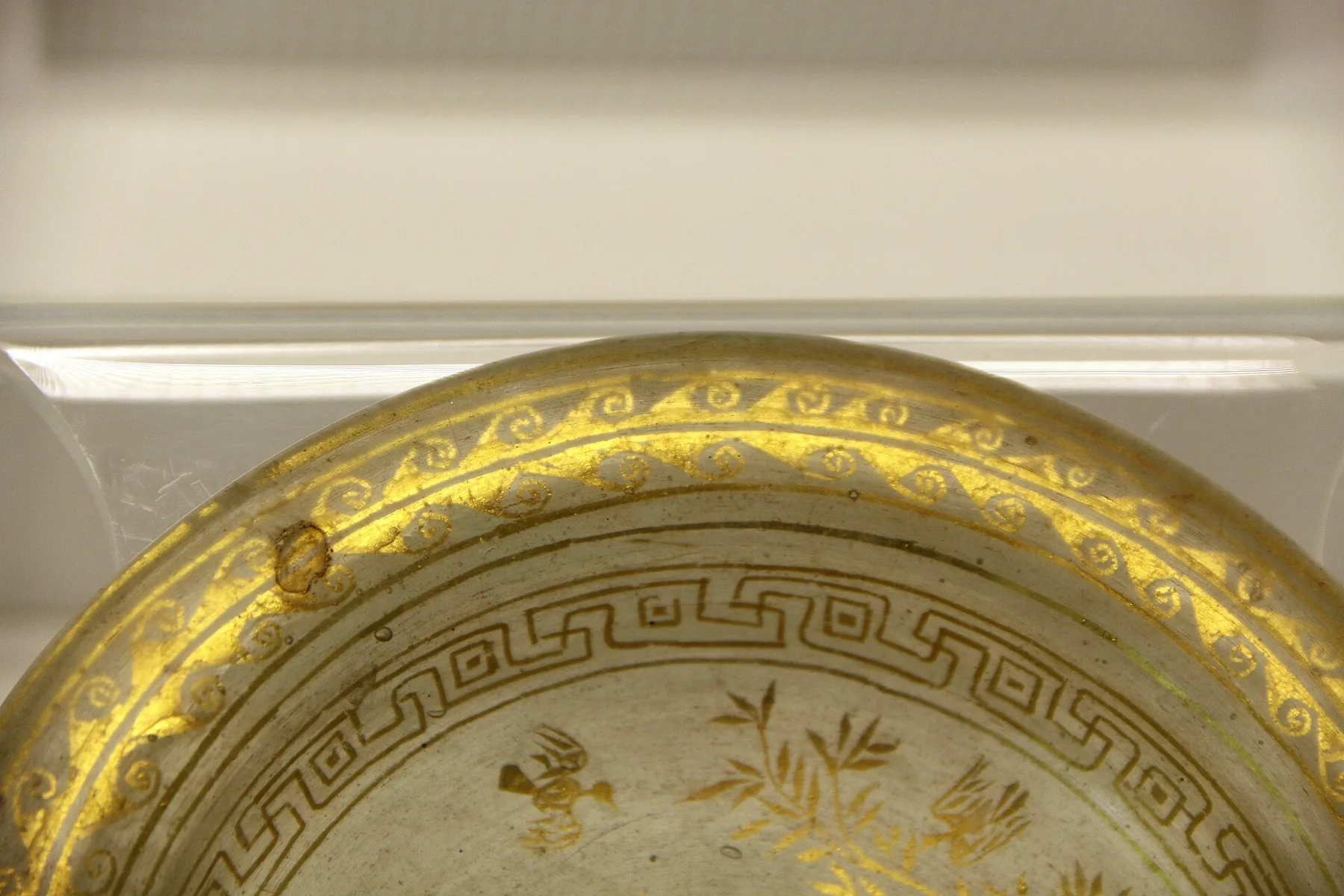 Golden Tibetan singing bowl in close-up Golden Tibetan singing bowl in close-up