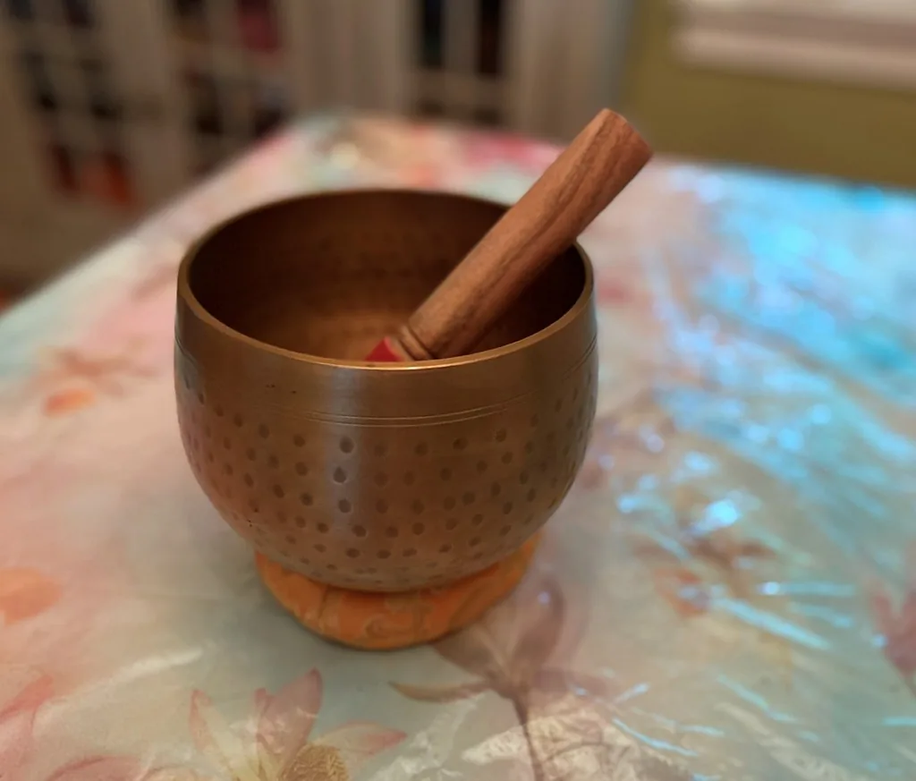 Tibetan singing bowl with wooden mallet Tibetan singing bowl with wooden mallet