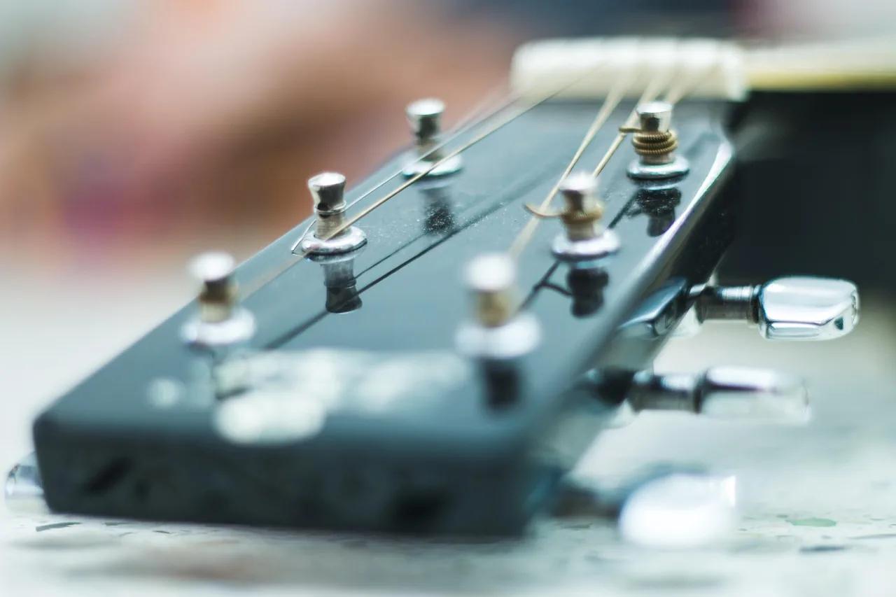 close-up of a guitar headstock close-up of a guitar headstock