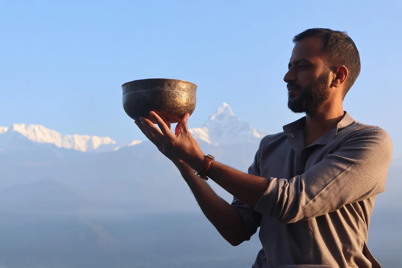 Tibetan singing bowl facing the mountains Tibetan singing bowl facing the mountains
