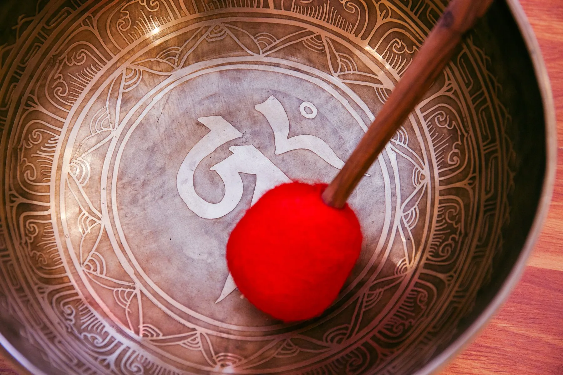 Engraved Tibetan bowl with mallet Engraved Tibetan bowl with mallet