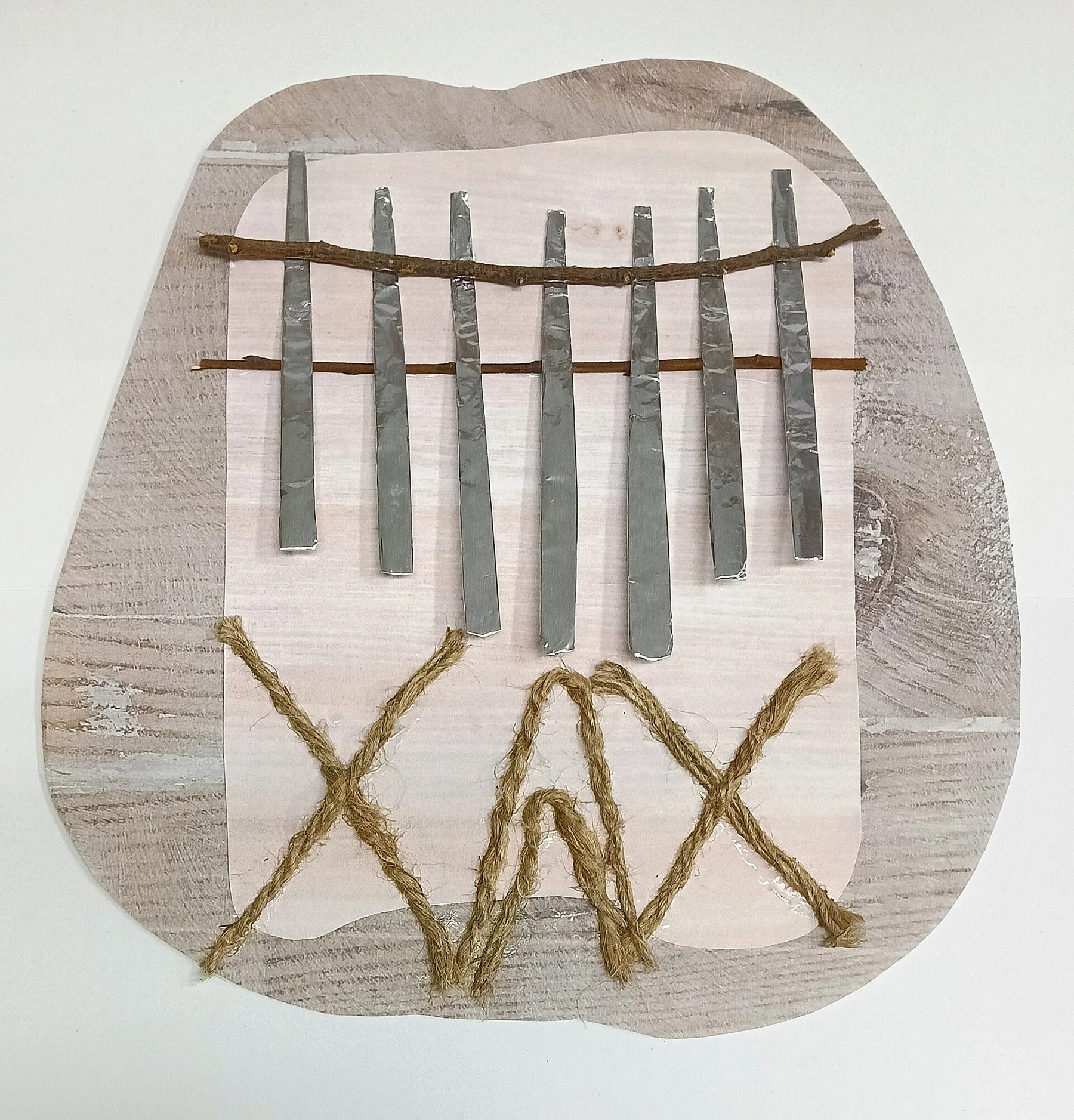 handcrafted kalimba on a wooden stand