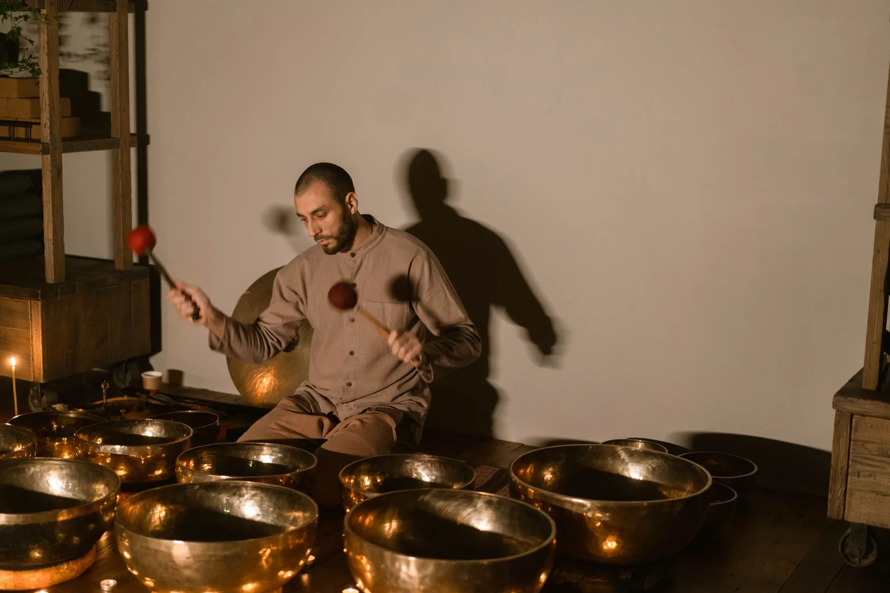 Tibetan singing bowls with mallets in meditation Tibetan singing bowls with mallets in meditation