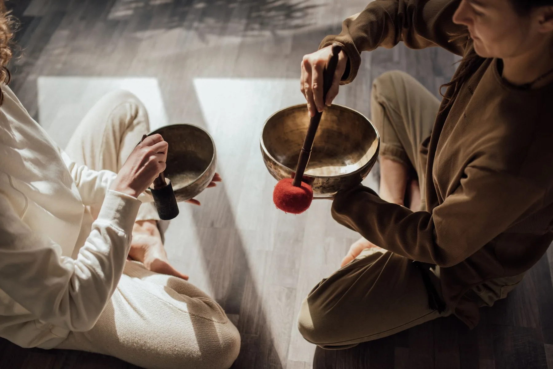 Tibetan bowls played with mallets Tibetan bowls played with mallets