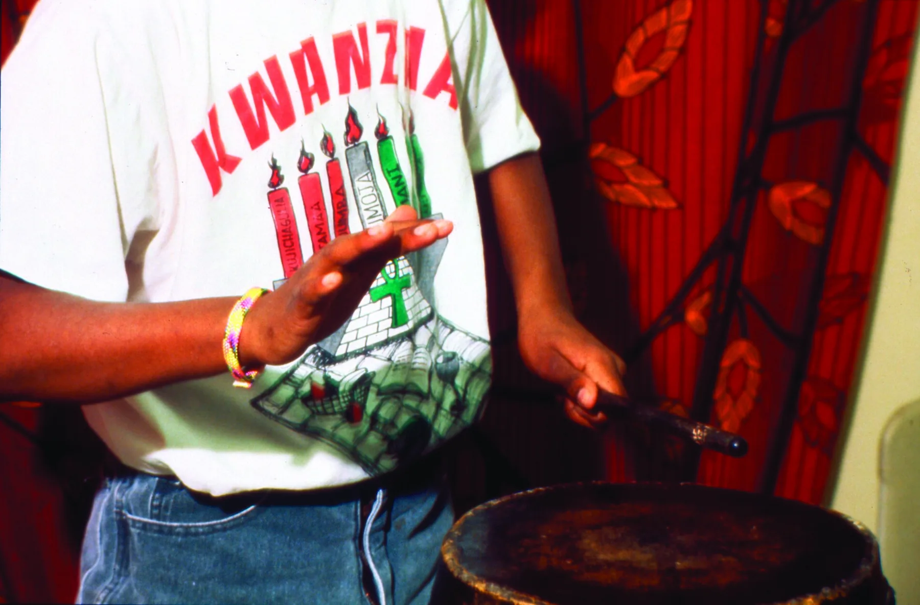 hand playing a traditional drum hand playing a traditional drum