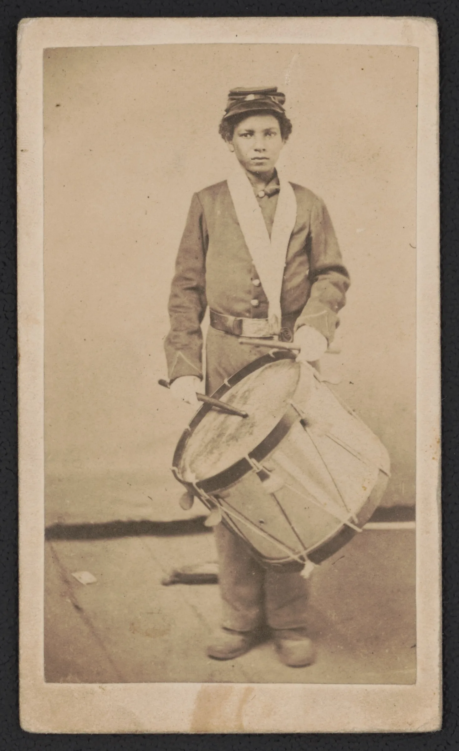 young vintage drummer in uniform young vintage drummer in uniform