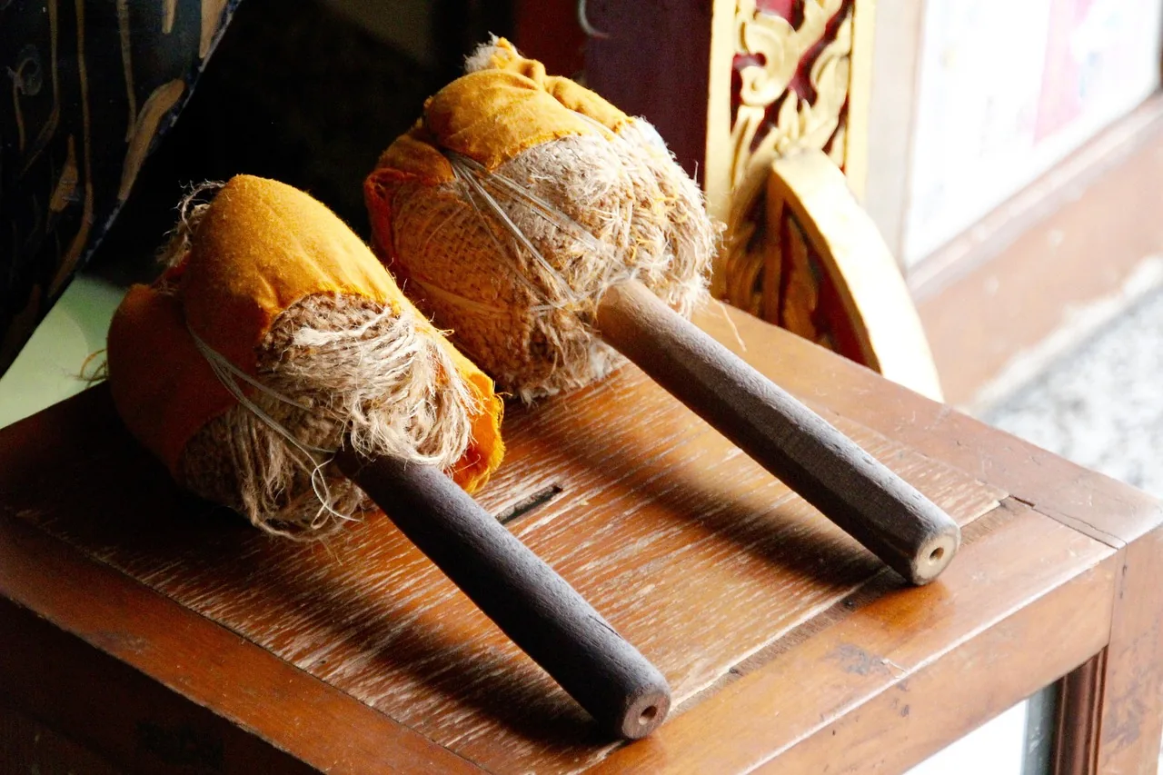 percussion mallets resting on furniture percussion mallets resting on furniture