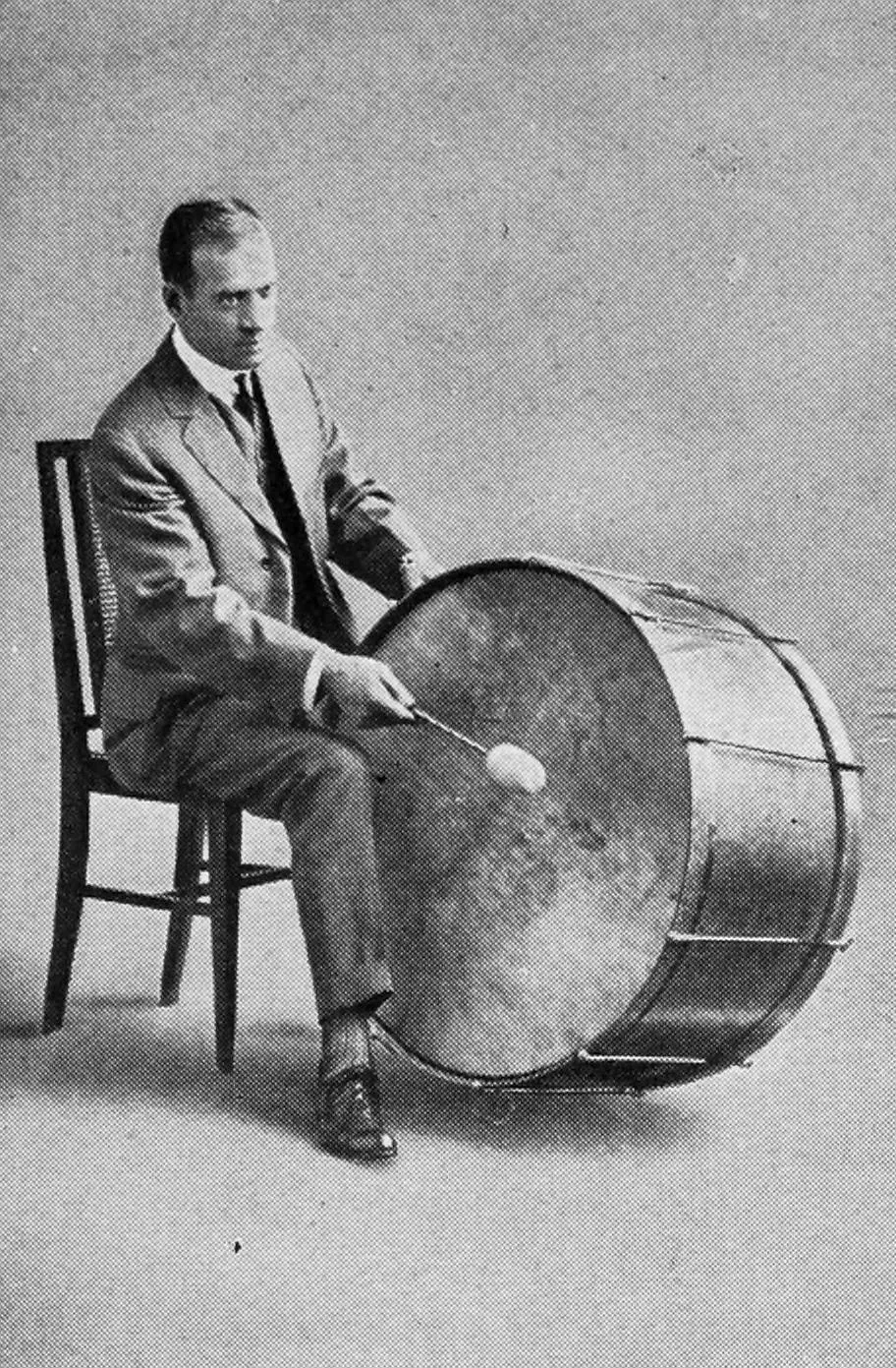 Musician with large drum and mallet Musician with large drum and mallet
